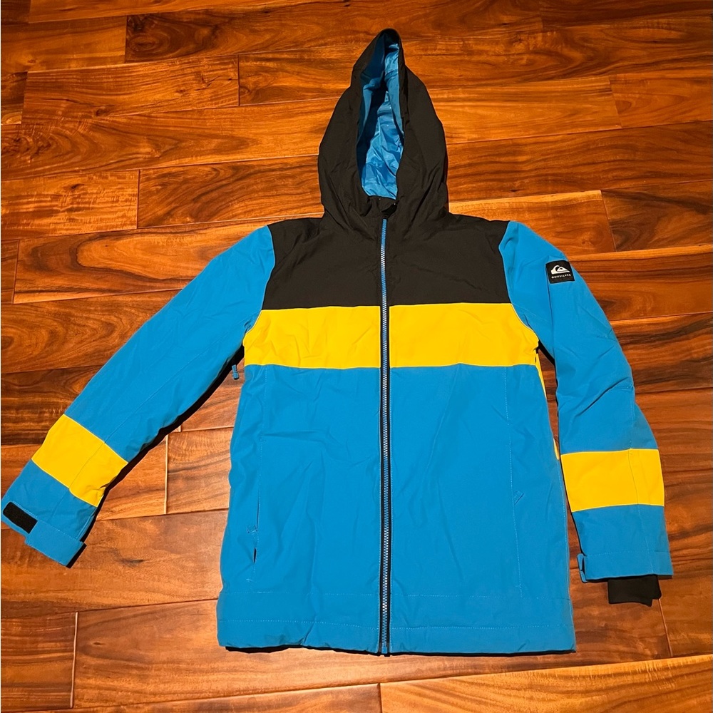 Quiksilver Snowboarding Jacket. Boys XL (14). Torquise blue, black and yellow.